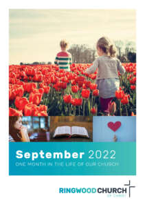 September 2022 monthly newsletter. Picture of children walking through field of tulips